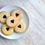 Jammy Dodgers recipe from Baking with Granny. Classic British biscuit. Melt-in-the-mouth, sandwiched with jam, and a little heart middle.