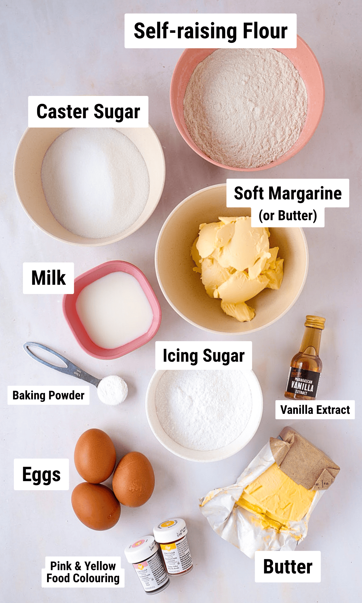 Ingredients for Angel Cake including flour, sugar, eggs, margarine, butter, milk and food colouring.
