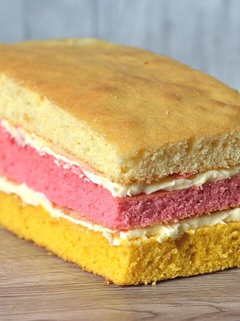 Angel Cake. The classic layer sponge loaf. Pink, yellow and plain, sandwiched together with buttercream.
