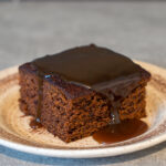 Sticky Toffee Pudding recipe from Baking with Granny. Sweet, moist date sponge, drowned in a sweet and creamy toffee sauce.