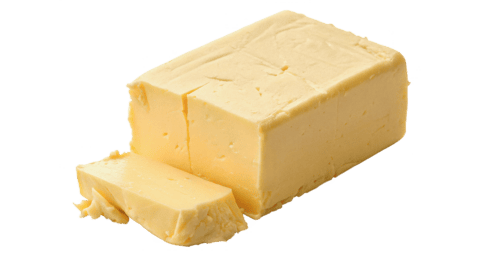 Block of British baking margarine with a slice cut off, ready for using.