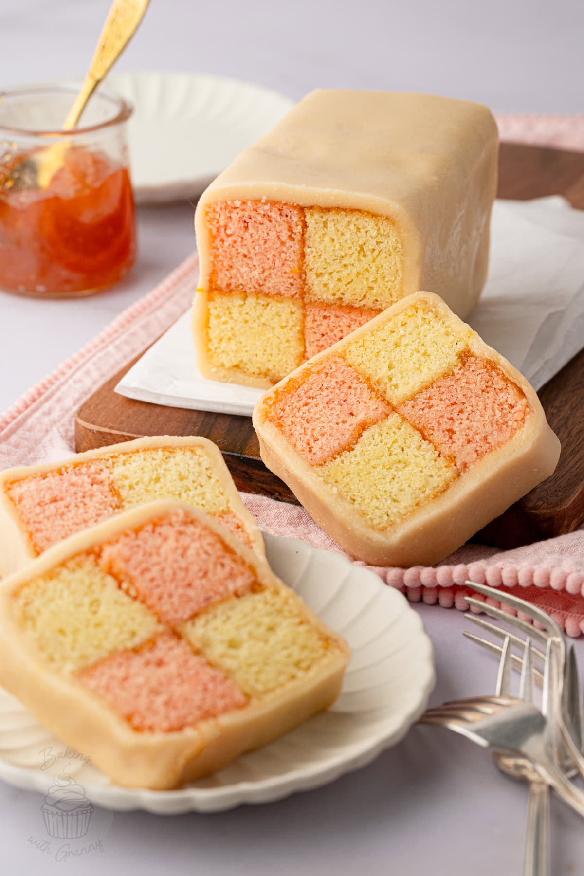 Battenberg cake with pink and plain almond sponge wrapped in marzipan.