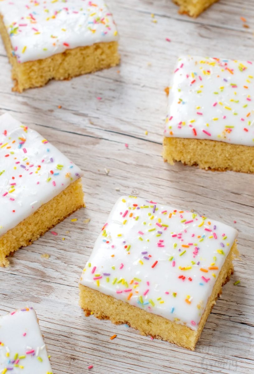 School Cake School Cake recipe by Baking with Granny. Sponge cake with white icing and rainbow sprinkles.